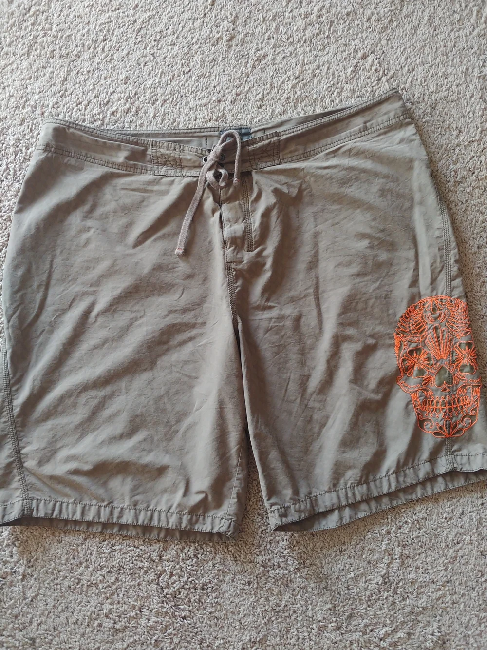 Old Navy Tan Hybrid Shorts with Orange Skull Accent